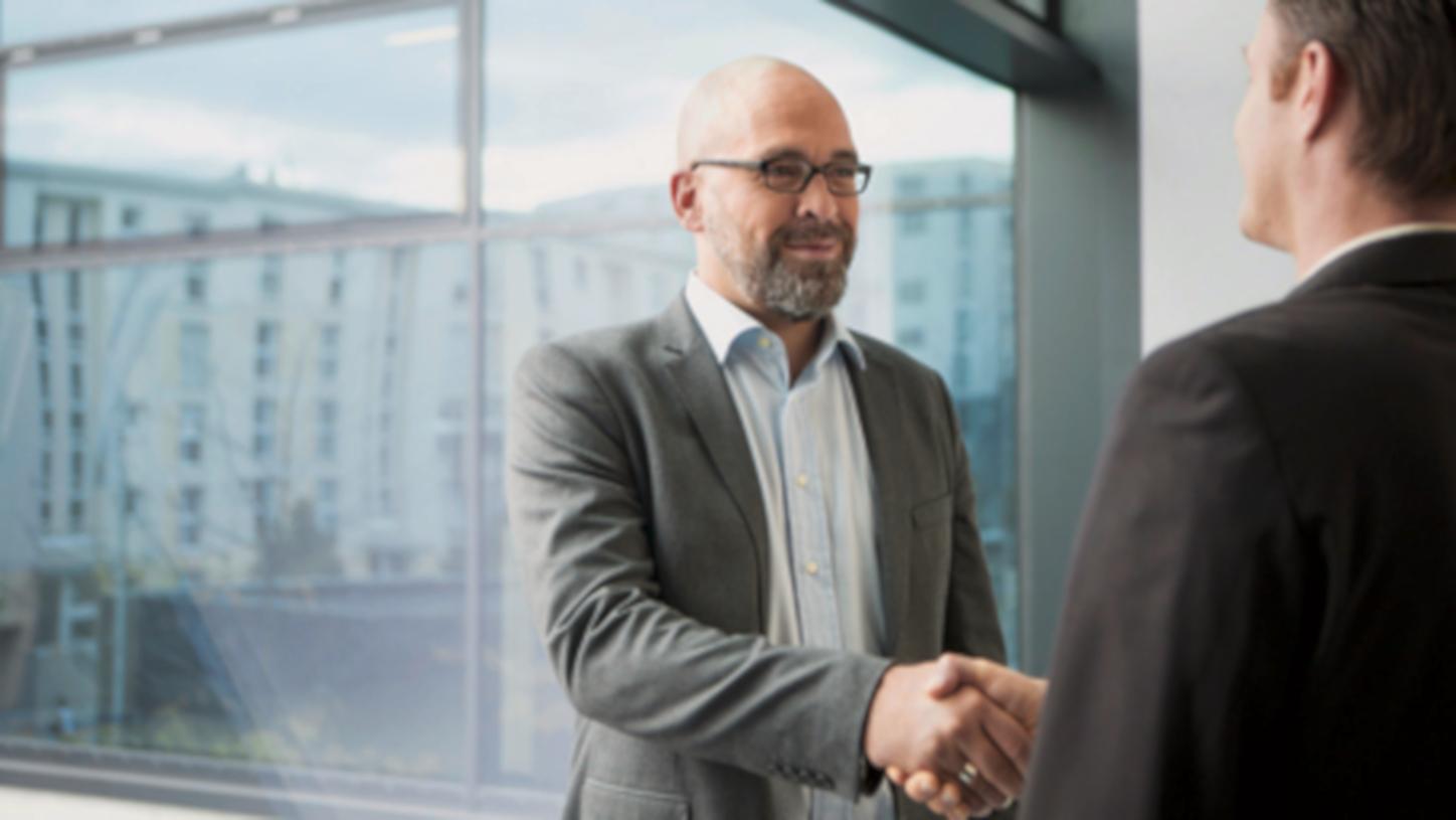 Two mens shaking hands