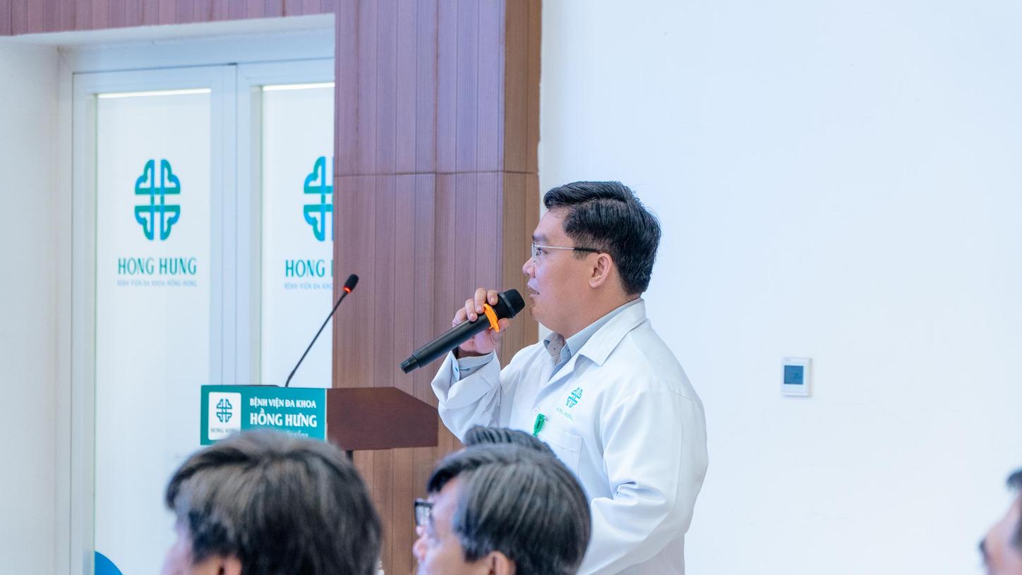 speaker at a scientific symposium