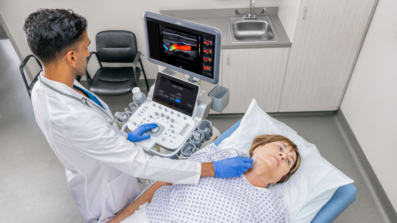 Doctor using ACUSON Maple for a carotid ultrasound exam
