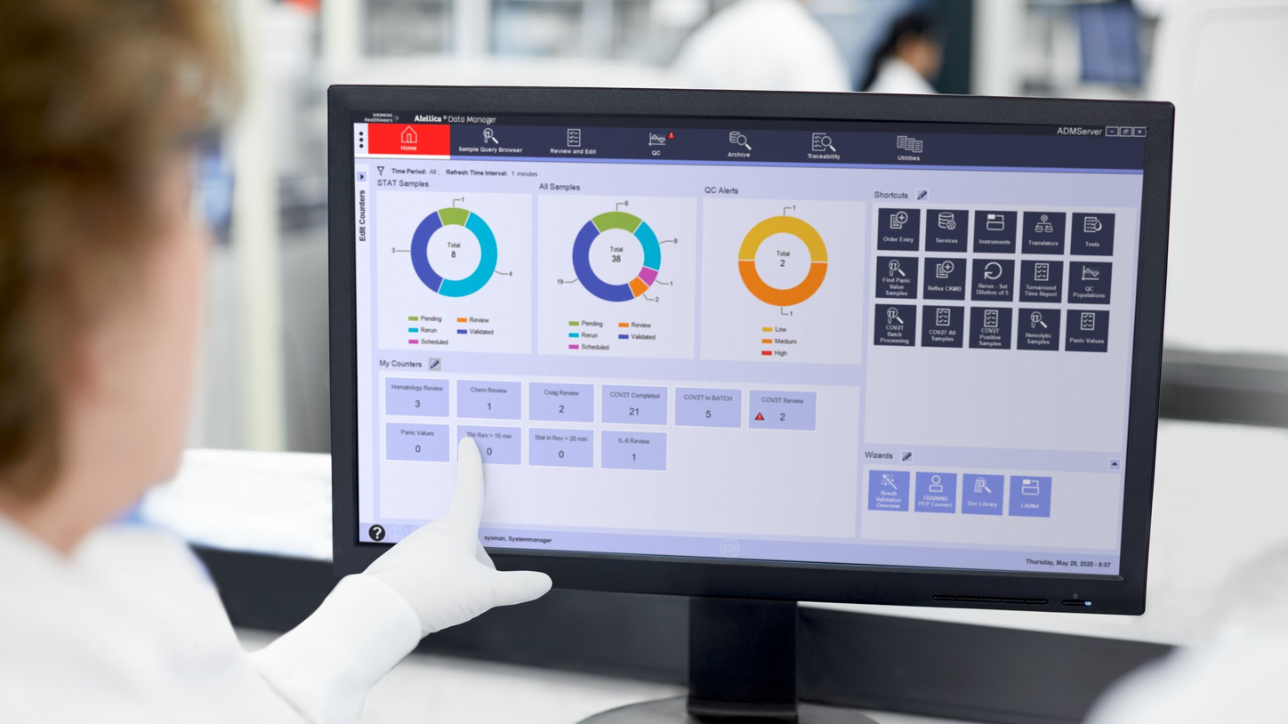 Healthcare professional using Atellica Data Manager