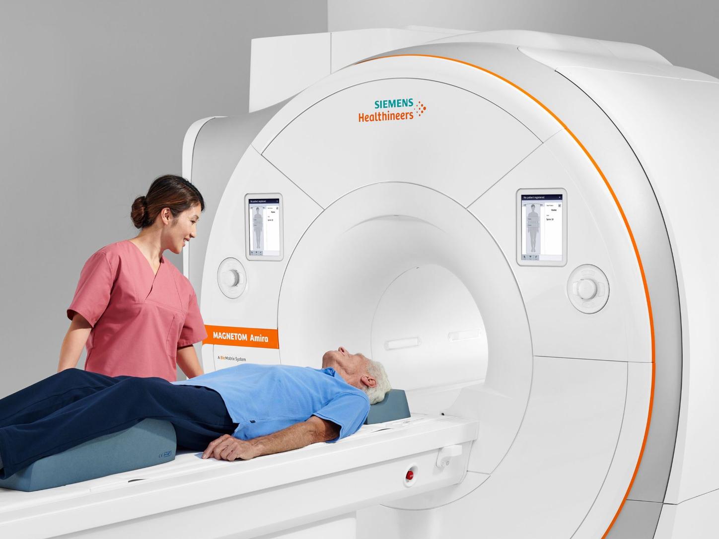 Doctor and Patient using the MAGNETOM Amira a BioMatrix system