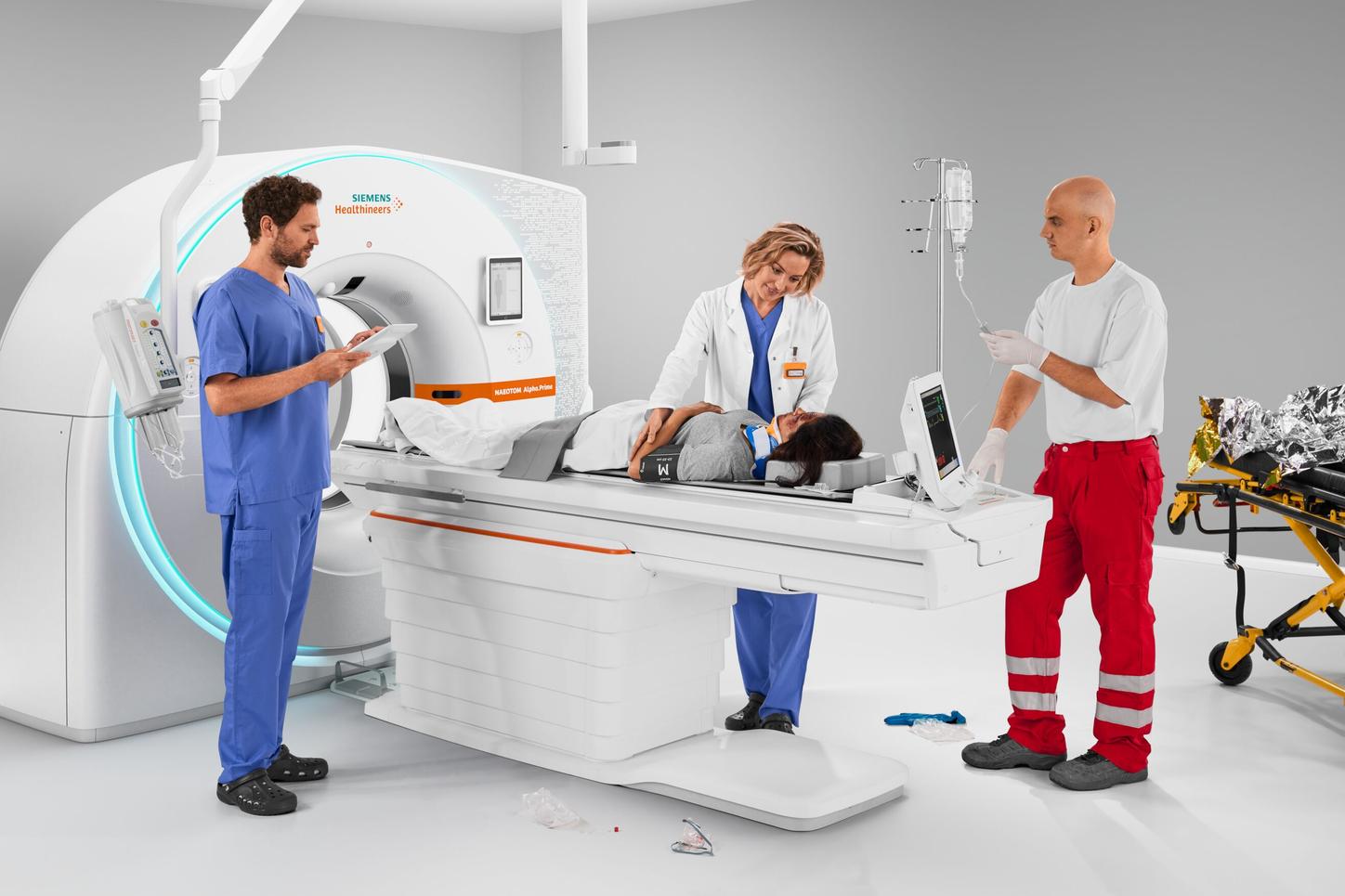 Doctors and patient with the NAEOTOM Alpha.Prime