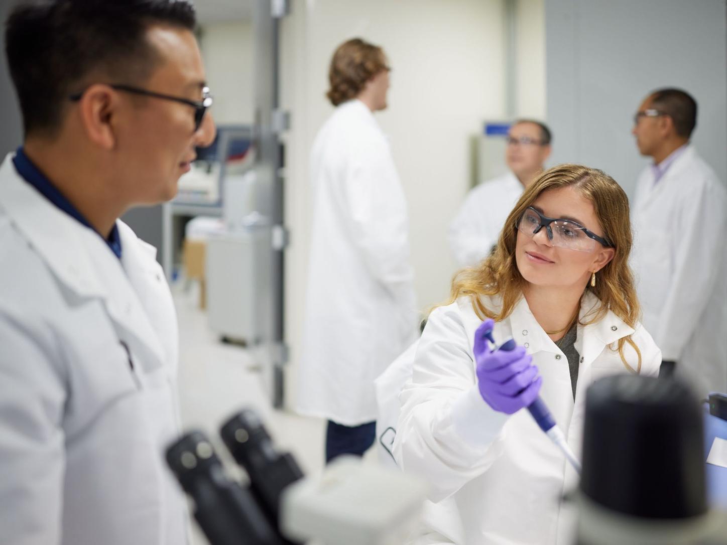 Healthcare professionals working in a lab