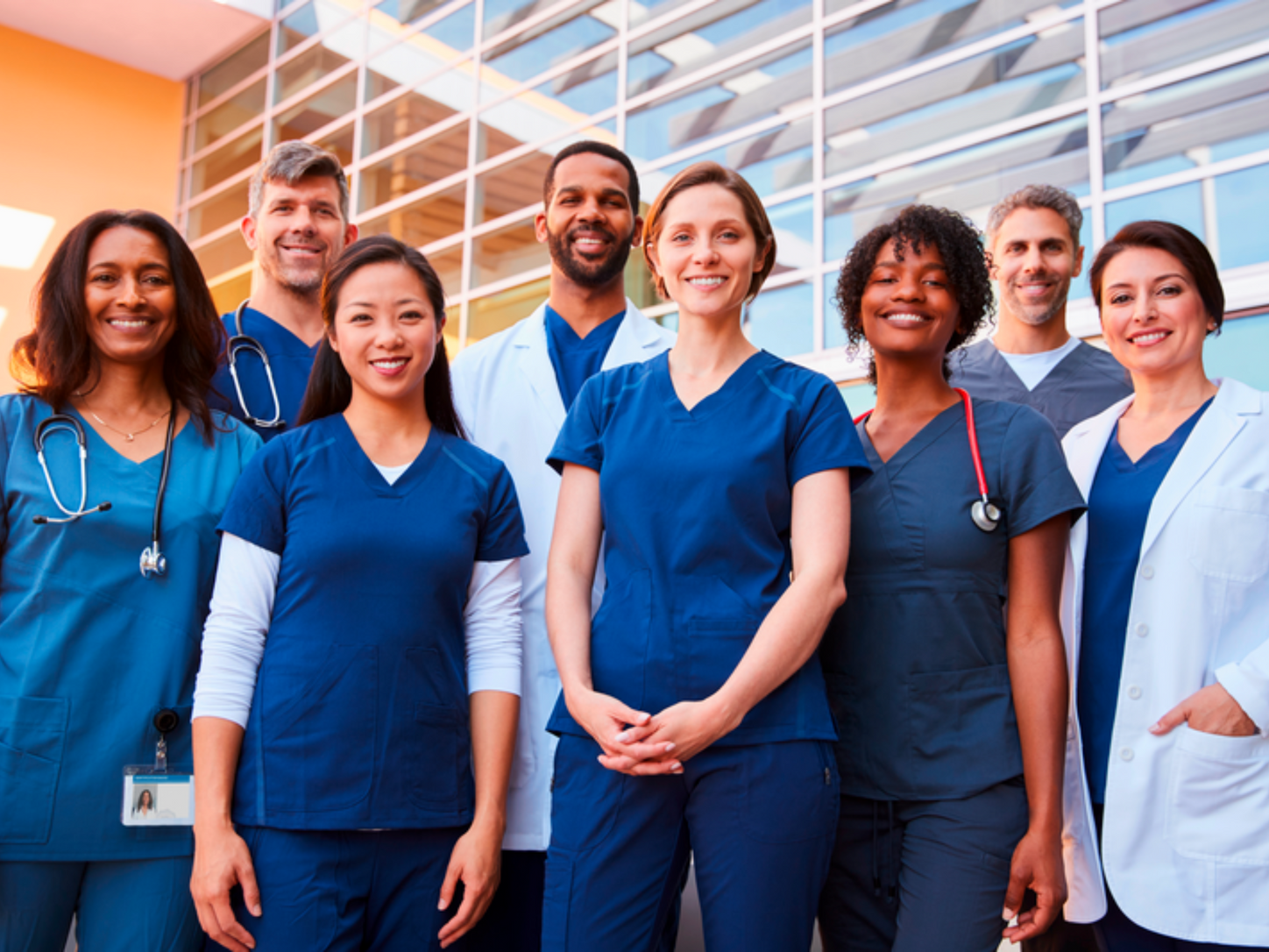 Doctors and Nurses outside a hospital