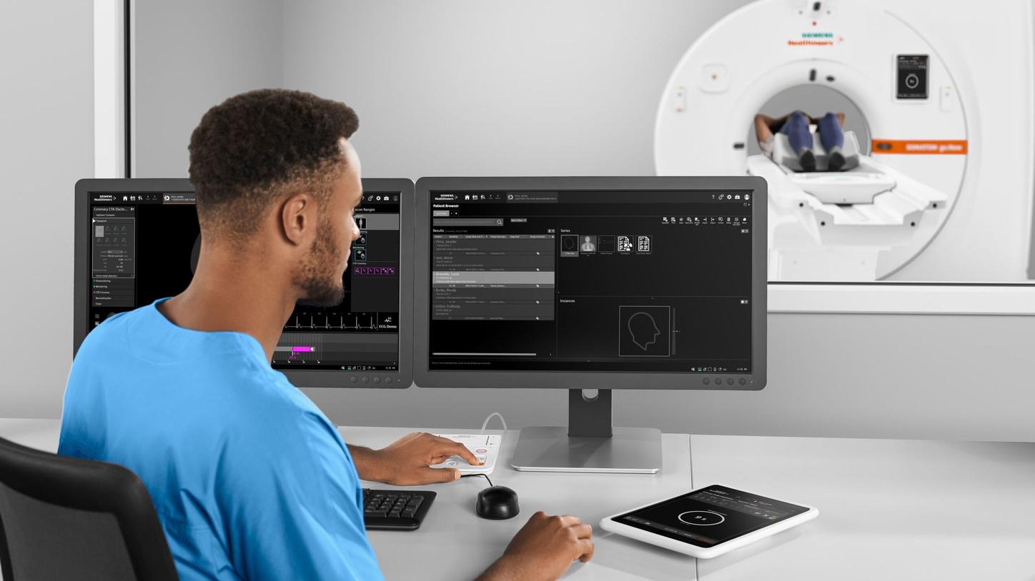 Man examins CT images