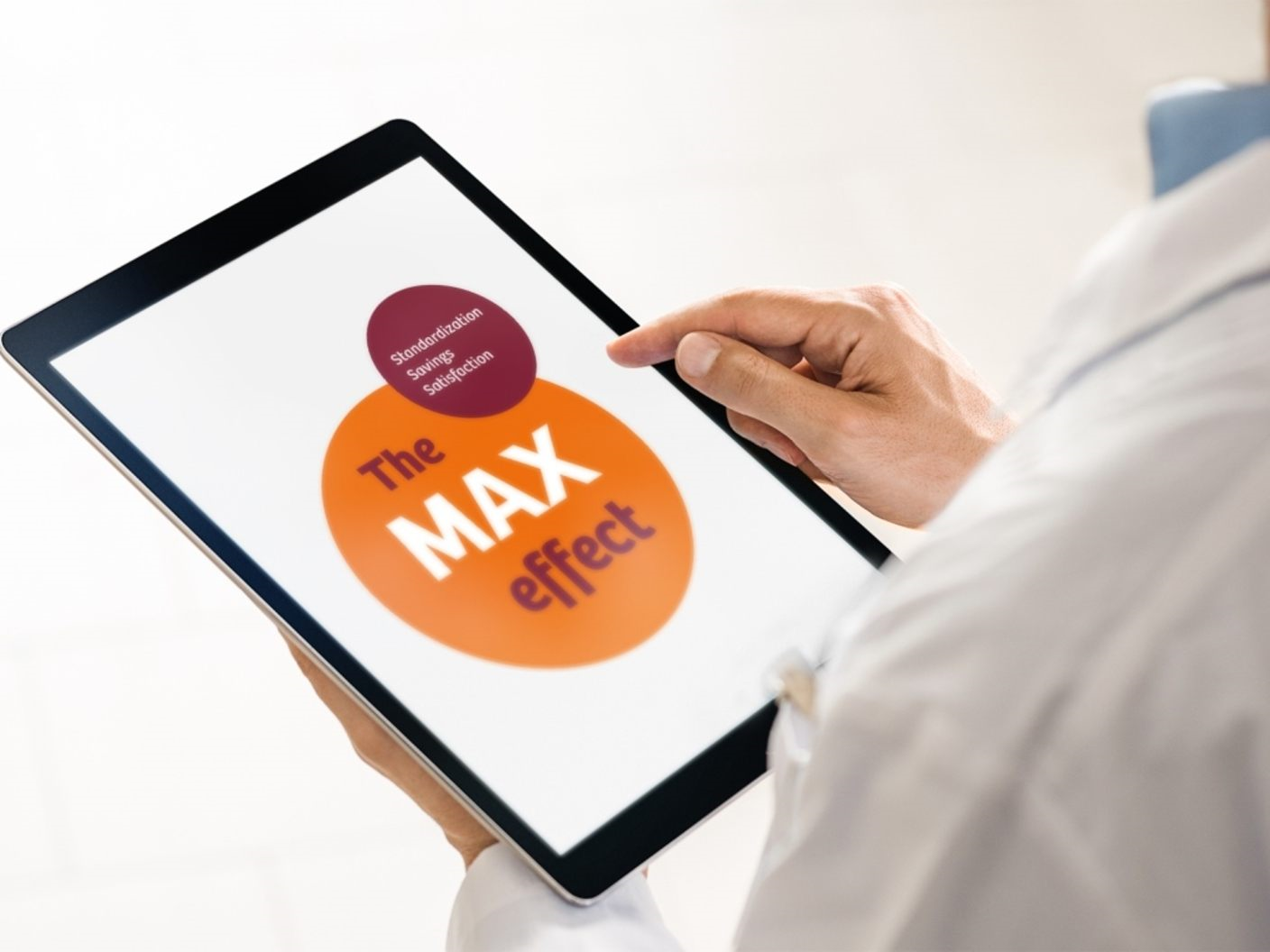 A person using the MAX effect on a digital tablet