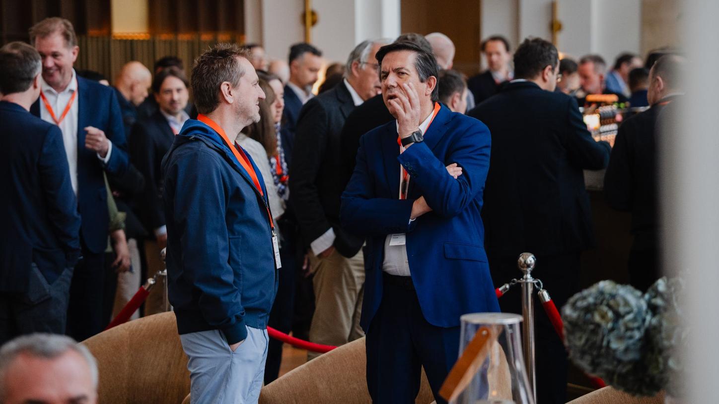 A candid photo from MI World Summit 2026 