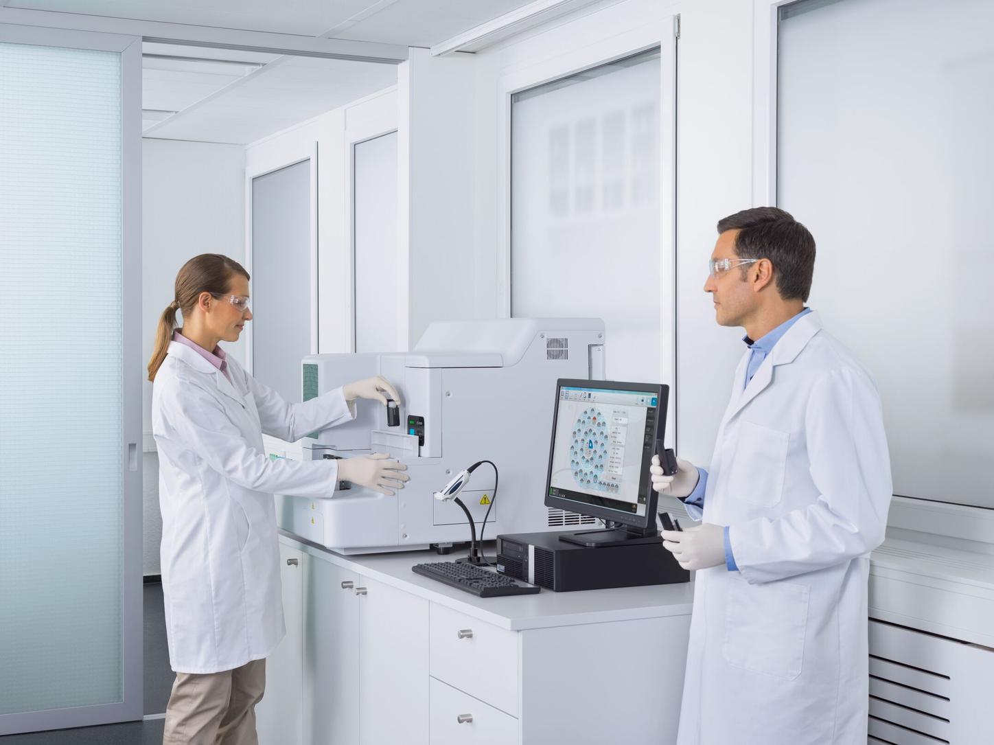 Lab techs using CS-2500 System