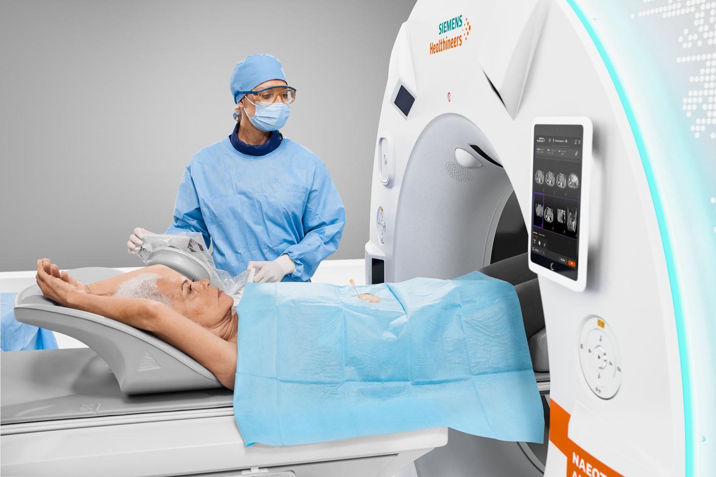 Doctor and patient with the NAEOTOM Alpha.Prime