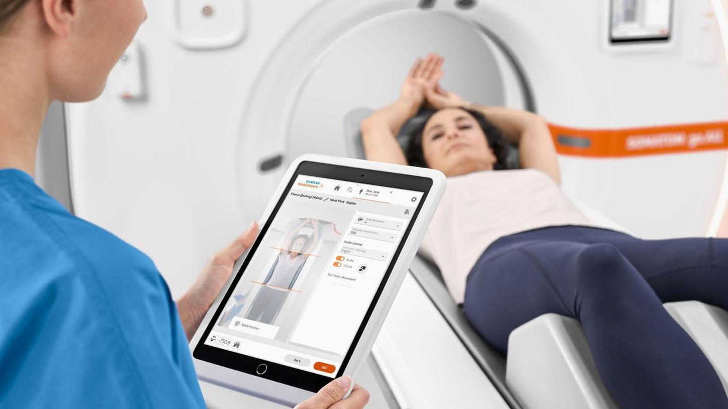 Healthcare professional using a mobile tablet